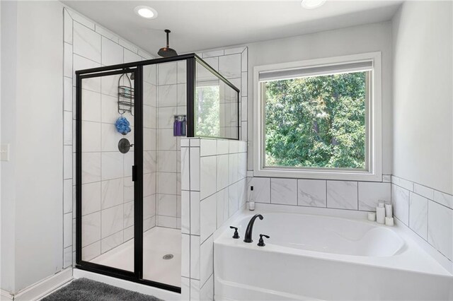 176 Red Wood Dr, Dallas, GA 30132 - bathroom with a shower stall, recessed lighting, and a bath