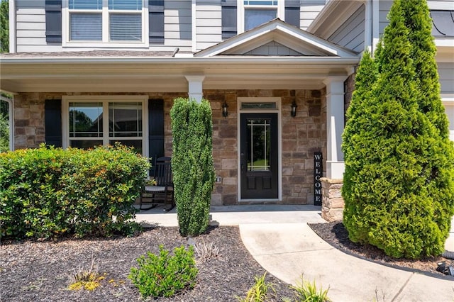 176 Red Wood Dr, Dallas, GA 30132 - property entrance with covered porch and stone siding