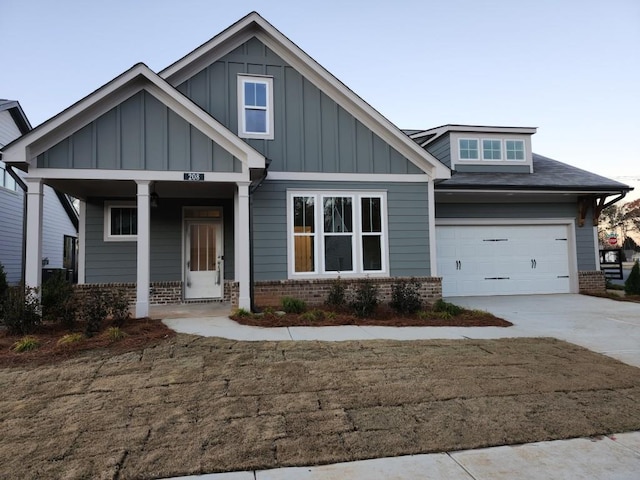 craftsman-style home with a porch and a garage