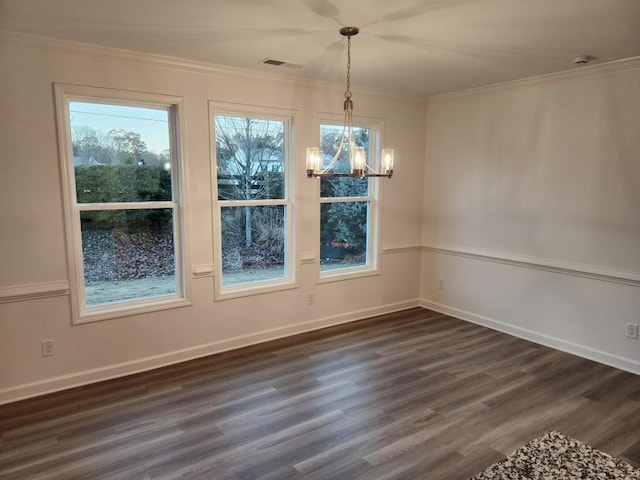 unfurnished dining area with a chandelier, dark hardwood / wood-style floors, and ornamental molding