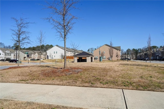 view of yard with a residential view