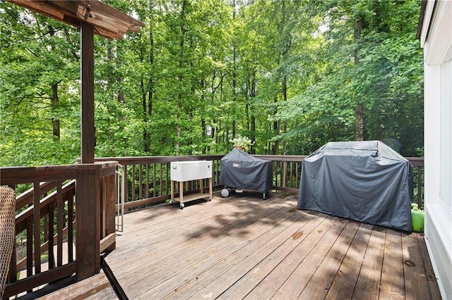 4522 Reva Ct NE, Marietta, GA 30066 - deck featuring a grill and a view of trees