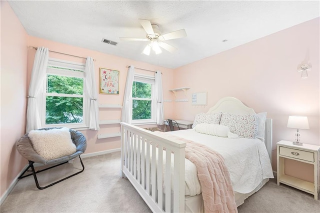 4522 Reva Ct NE, Marietta, GA 30066 - bedroom featuring light carpet and a ceiling fan
