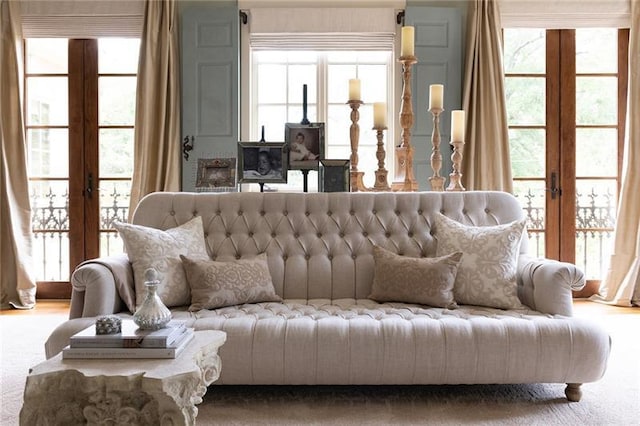 living room featuring carpet floors and french doors