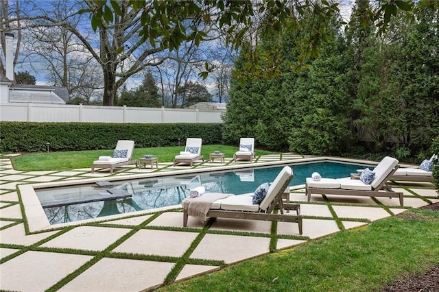 view of pool featuring a patio