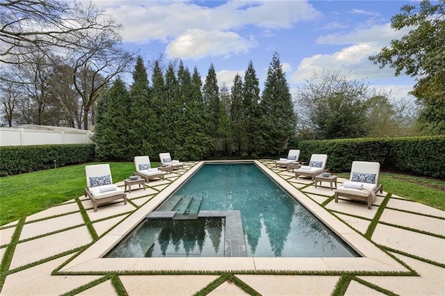 view of pool featuring a patio