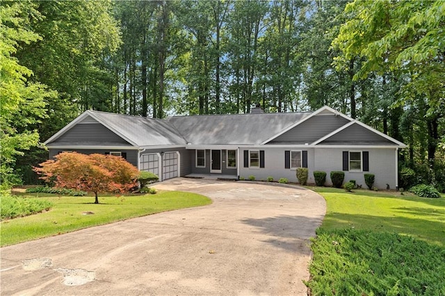 2865 Bryant Ct, Cumming, GA 30040 - ranch-style home featuring a garage, driveway, a front yard, and a chimney