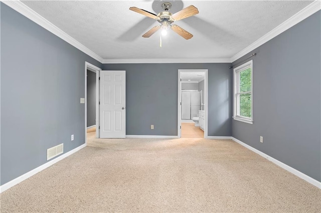 2865 Bryant Ct, Cumming, GA 30040 - unfurnished bedroom with light colored carpet, a textured ceiling, baseboards, ornamental molding, and ensuite bath