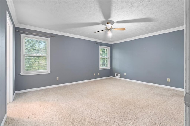2865 Bryant Ct, Cumming, GA 30040 - spare room featuring a ceiling fan, carpet, baseboards, crown molding, and a textured ceiling