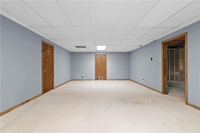2865 Bryant Ct, Cumming, GA 30040 - carpeted empty room featuring baseboards and a paneled ceiling