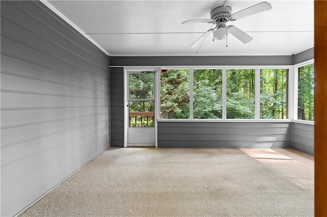 2865 Bryant Ct, Cumming, GA 30040 - unfurnished sunroom featuring ceiling fan, healthy amount of natural light, carpet floors, and crown molding
