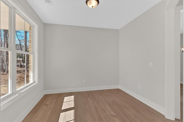 empty room with light wood-type flooring