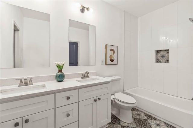 2206 Loring Ct, Decatur, GA 30032 - full bath with double vanity, toilet, tile patterned flooring, and a sink