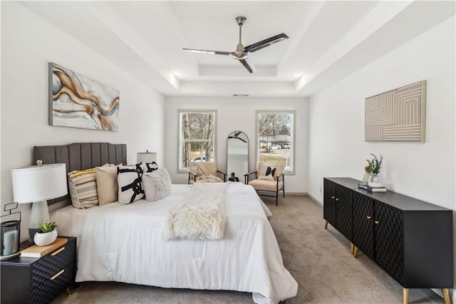 2206 Loring Ct, Decatur, GA 30032 - carpeted bedroom with a raised ceiling and ceiling fan