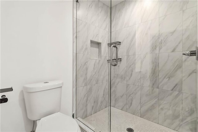 2206 Loring Ct, Decatur, GA 30032 - bathroom featuring toilet and a shower stall