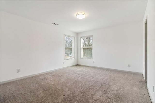 2206 Loring Ct, Decatur, GA 30032 - carpeted empty room with visible vents and baseboards