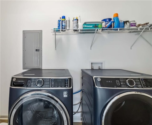 2206 Loring Ct, Decatur, GA 30032 - clothes washing area with electric panel, laundry area, and washing machine and dryer