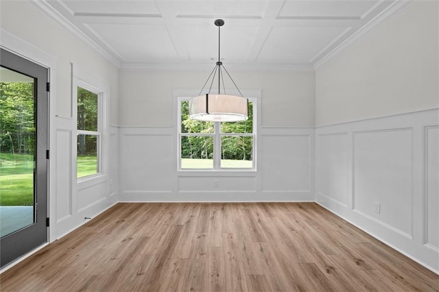130 W Lake Blvd, Carrollton, GA 30116 - unfurnished dining area with a decorative wall, light wood-style flooring, and wainscoting