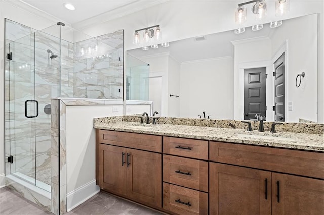 130 W Lake Blvd, Carrollton, GA 30116 - full bathroom featuring marble finish flooring, crown molding, a stall shower, baseboards, and double vanity