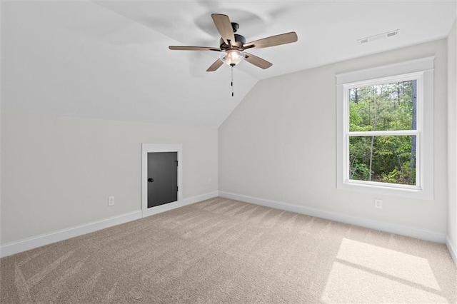 130 W Lake Blvd, Carrollton, GA 30116 - additional living space with light colored carpet, baseboards, lofted ceiling, and ceiling fan