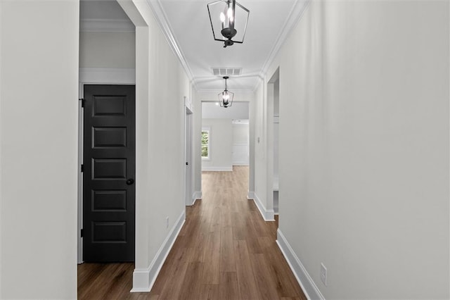 130 W Lake Blvd, Carrollton, GA 30116 - hall with dark wood-type flooring, baseboards, and ornamental molding