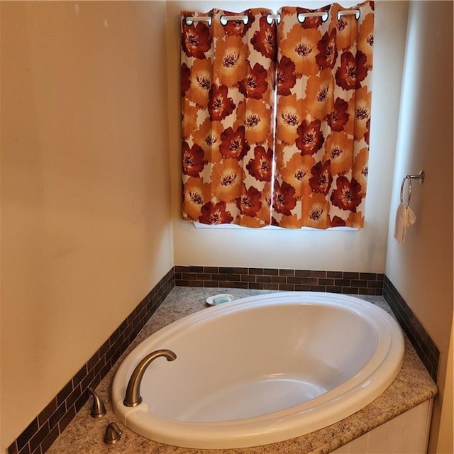 full bathroom featuring a bath