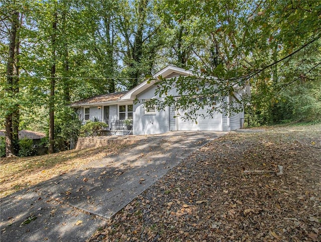 ranch-style home with a garage