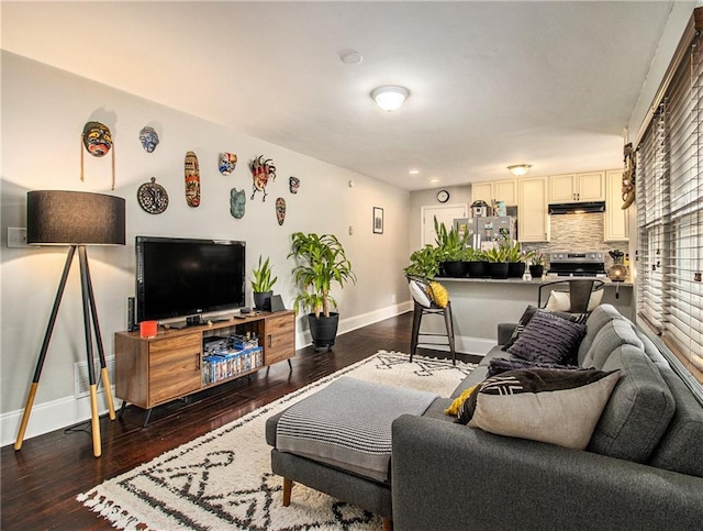 living room featuring dark wood-type flooring