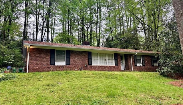 single story home with brick siding and a front yard