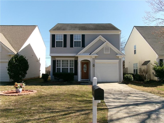 view of front of home featuring a garage, a front yard, and concrete driveway