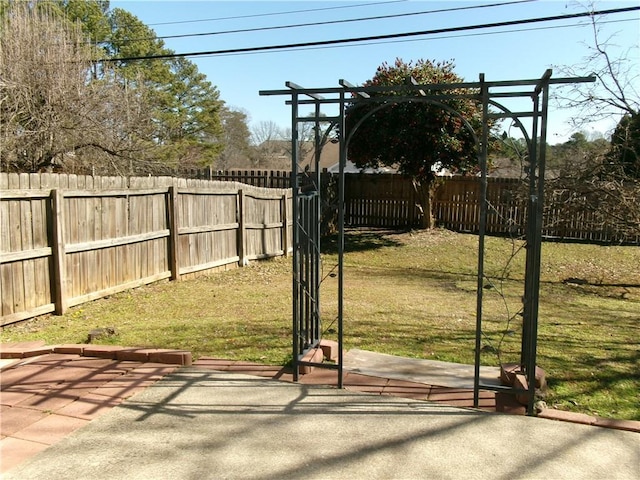 view of yard featuring a patio and a fenced backyard