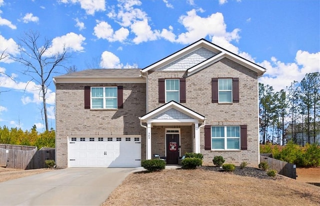 view of front of property with a garage, brick siding, driveway, and fence