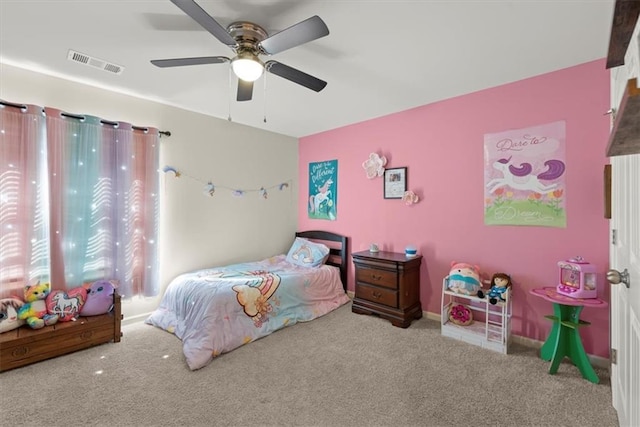 bedroom featuring a ceiling fan, baseboards, visible vents, and carpet flooring