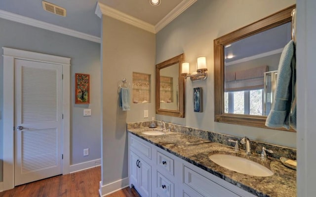 126 Jenkins Cir, Lakemont, GA 30552 - bathroom with double vanity, wood finished floors, ornamental molding, and recessed lighting