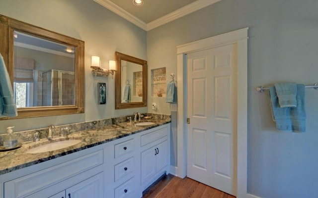 126 Jenkins Cir, Lakemont, GA 30552 - bathroom with crown molding, a shower stall, double vanity, wood finished floors, and recessed lighting