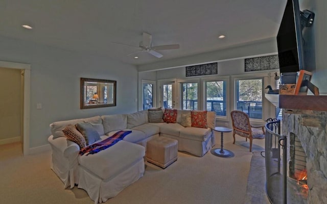 126 Jenkins Cir, Lakemont, GA 30552 - living room with a warm lit fireplace, ceiling fan, carpet flooring, and recessed lighting