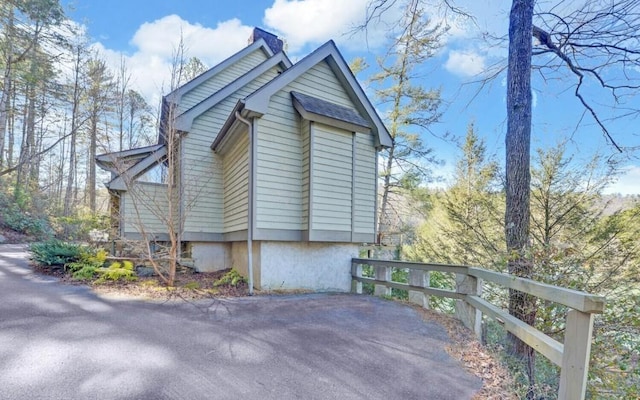 126 Jenkins Cir, Lakemont, GA 30552 - view of property exterior with a chimney