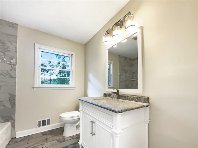 3811 Reynolds Rd, Douglasville, GA 30135 - full bathroom with toilet, a shower, vanity, visible vents, and baseboards