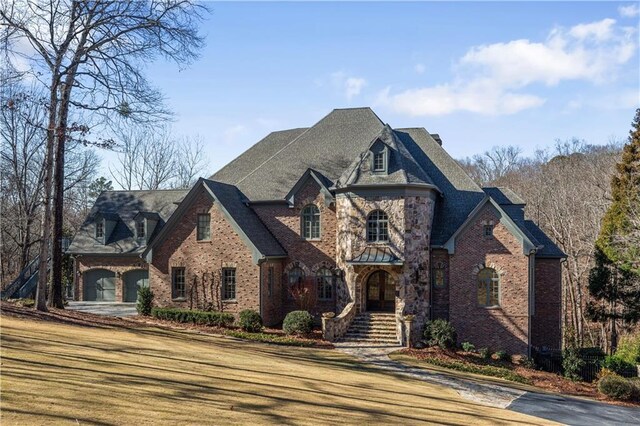 view of front of home with a garage