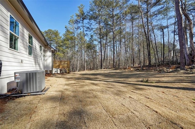 view of yard featuring central AC unit