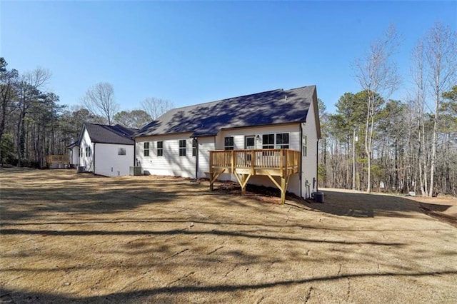 rear view of house with a deck