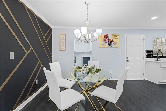 1931 Selwyn Dr, Decatur, GA 30035 - dining area featuring a chandelier, dark wood-style floors, crown molding, baseboards, and recessed lighting