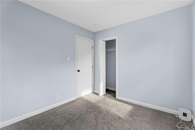 1931 Selwyn Dr, Decatur, GA 30035 - unfurnished bedroom with carpet flooring, baseboards, and a closet