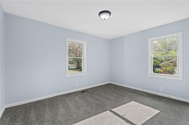 1931 Selwyn Dr, Decatur, GA 30035 - empty room with carpet flooring, healthy amount of natural light, and baseboards