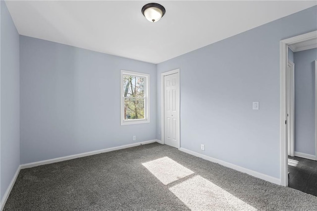 1931 Selwyn Dr, Decatur, GA 30035 - spare room featuring dark carpet and baseboards