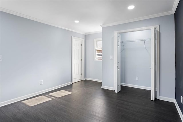 1931 Selwyn Dr, Decatur, GA 30035 - unfurnished bedroom with ornamental molding, dark wood finished floors, baseboards, recessed lighting, and a closet