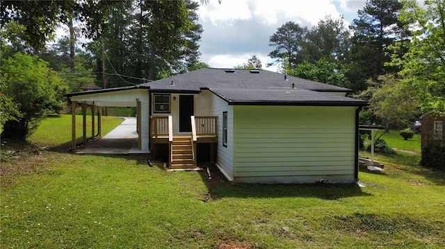 1931 Selwyn Dr, Decatur, GA 30035 - back of property featuring a yard and an attached carport