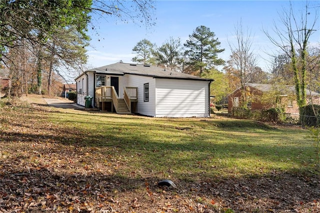 1931 Selwyn Dr, Decatur, GA 30035 - back of house featuring a lawn