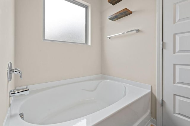 bathroom with a washtub