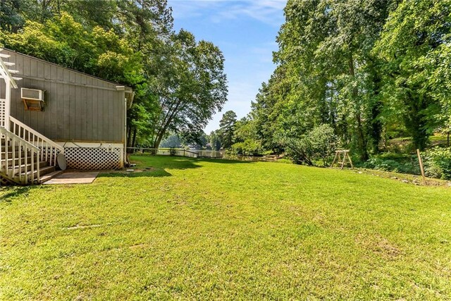 view of yard with a deck